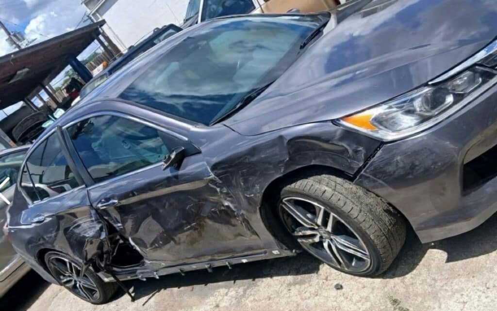 before image of side panel scuff marks and dents